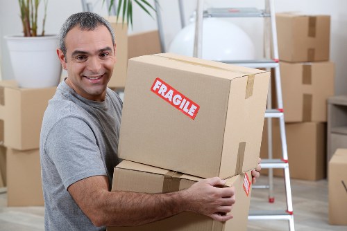 Removal truck ready for hire with Movers Man with Van