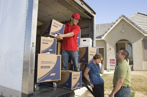 Professional movers handling household items