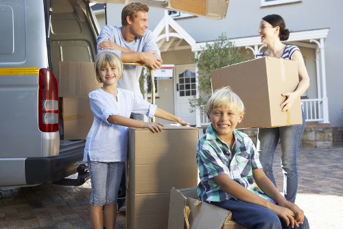 Movers setting up office space at new location
